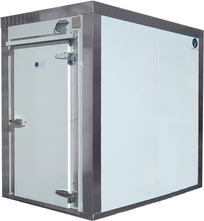 Chambre froide compacte installée à l'extérieur contre un mur de briques.