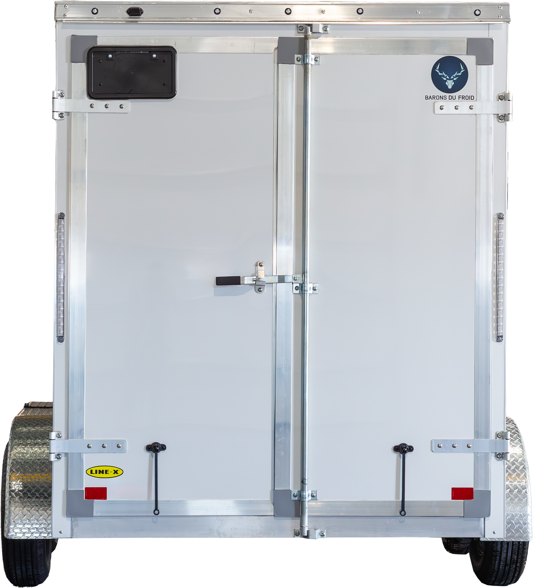 Vue arrière d’une remorque réfrigérée blanche avec portes doubles.